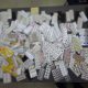 FOTO // Pastile psihotrope ascunse în haine și medicamente dosite în valiză. Două tentative de contrabandă, dejucate la frontieră